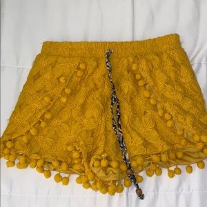 Gold mini shorts